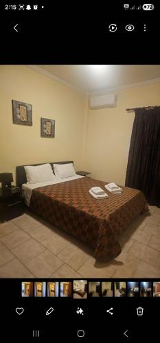 Ένα ή περισσότερα κρεβάτια σε δωμάτιο στο Diakopto One