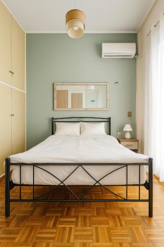 Postel nebo postele na pokoji v ubytování Feel's Like Home Apartment