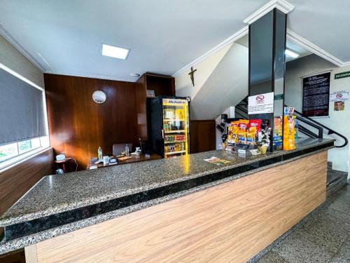 a fast food counter in a fast food restaurant at Colonial Hotel in Campo Grande