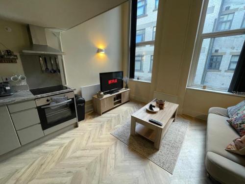 Kuchyň nebo kuchyňský kout v ubytování Central Leeds Apartment Oasis