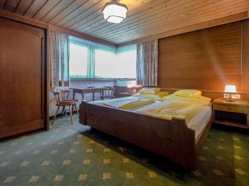 Postel nebo postele na pokoji v ubytování Sonnenhotel Soldanella Sonneck