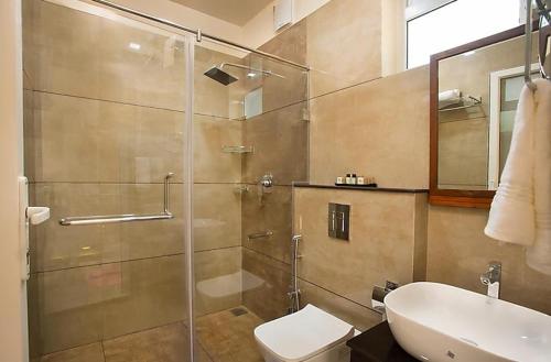 Ένα μπάνιο στο Hotel The Grand Helix Near Delhi Airport