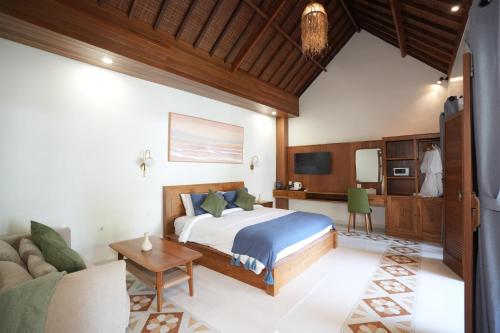 Ένα ή περισσότερα κρεβάτια σε δωμάτιο στο Kania Rooms & Suite