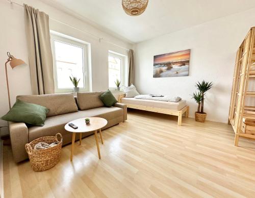 En eller flere senge i et værelse på Gemütliches 3-Raum-Nest im 2.OG