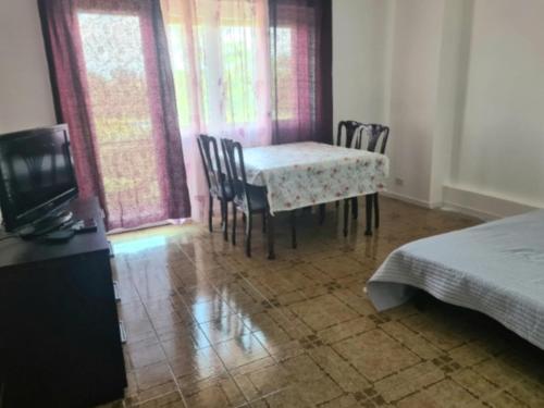 Ένα ή περισσότερα κρεβάτια σε δωμάτιο στο Appartement moderne et lumineux à Rome Italie