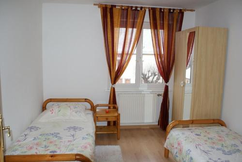 Ένα ή περισσότερα κρεβάτια σε δωμάτιο στο Gonzalez