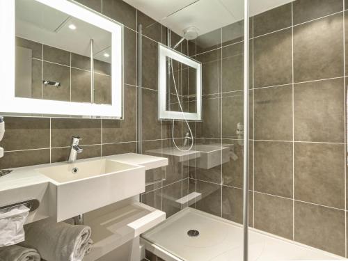 Koupelna v ubytování Novotel Chartres