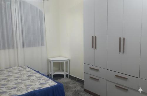 Ένα ή περισσότερα κρεβάτια σε δωμάτιο στο Ap de frente a praia das Tartarugas