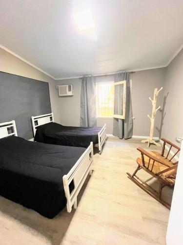 Giường trong phòng chung tại Quinta Villa Glori