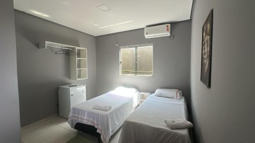 Postel nebo postele na pokoji v ubytování Varandas Hotel