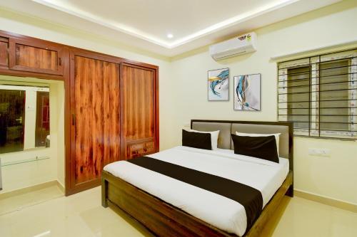 Ένα ή περισσότερα κρεβάτια σε δωμάτιο στο Hotel O RS HOTELS