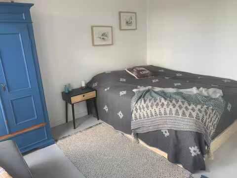 Ένα ή περισσότερα κρεβάτια σε δωμάτιο στο Holiday Home With Sea View