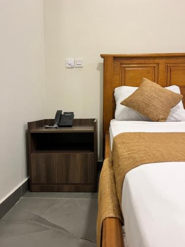 Postel nebo postele na pokoji v ubytování Screenshot Hotel Mtwapa