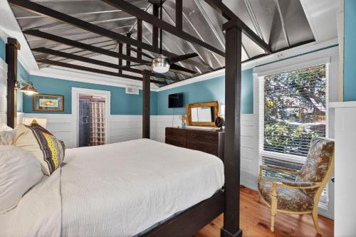 a bedroom with a bed and a window at PW1310: 1310 Pelican Watch in Seabrook Island