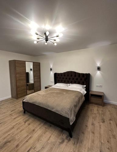 Postel nebo postele na pokoji v ubytování Люкс апартаменти Площа,Госпіталь