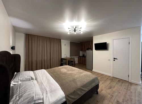 Postel nebo postele na pokoji v ubytování Люкс апартаменти Площа,Госпіталь