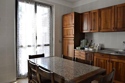 Kuchyň nebo kuchyňský kout v ubytování A Casa di Alfonso Malpensa Airport