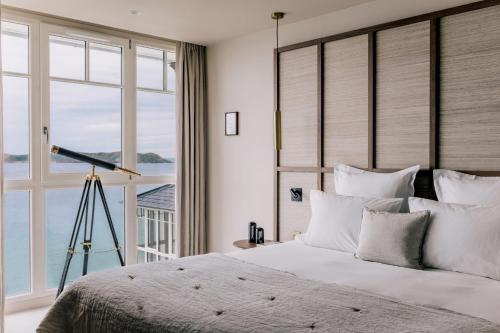 Ένα ή περισσότερα κρεβάτια σε δωμάτιο στο Les Bassans