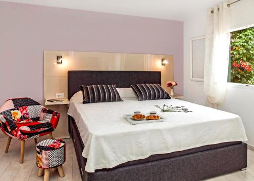 Postel nebo postele na pokoji v ubytování Holiday home Ika