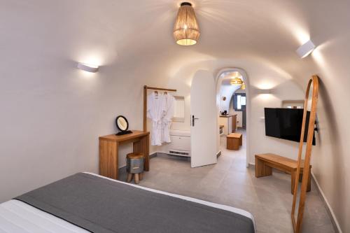 Ένα ή περισσότερα κρεβάτια σε δωμάτιο στο Cavora Suites