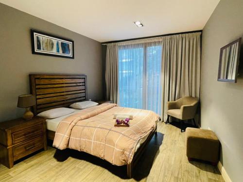 Postel nebo postele na pokoji v ubytování The Pearl In City by WOW Property - Direct from developer