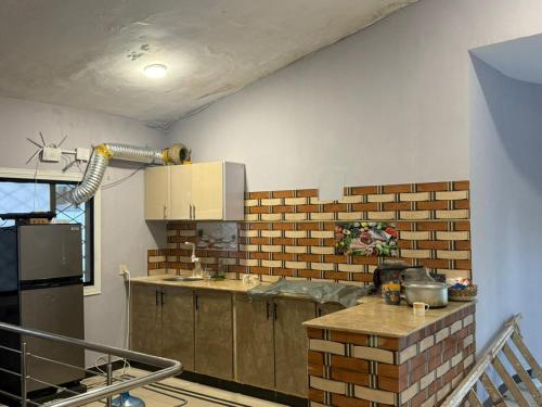 Köök või kööginurk majutusasutuses Serene Stay - 7 BHK Villa