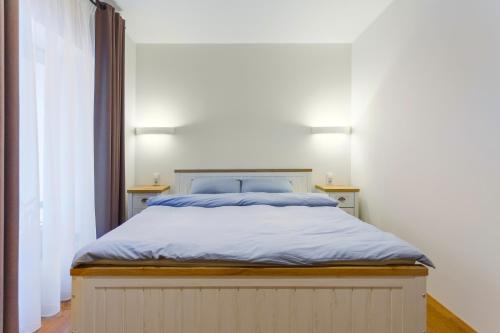 Ένα ή περισσότερα κρεβάτια σε δωμάτιο στο 15 Hretska Street