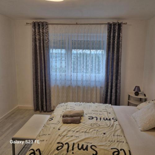 Ένα ή περισσότερα κρεβάτια σε δωμάτιο στο Esquina