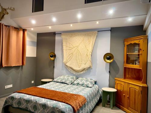 Postel nebo postele na pokoji v ubytování L’écrin des bois