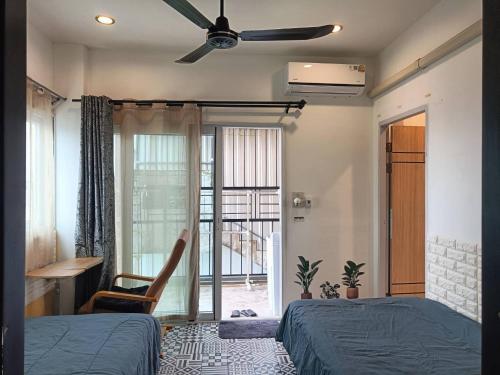 Postel nebo postele na pokoji v ubytování Merit Courtyard Suvarnabhumi House