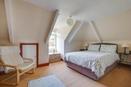 En eller flere senge i et værelse på Moonrakers