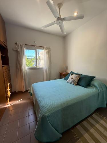 En eller flere senge i et værelse på Departamento 102 planta alta