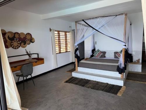 Postel nebo postele na pokoji v ubytování Villa Nosy Breizh