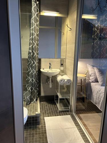 Koupelna v ubytování Kalnciema 18