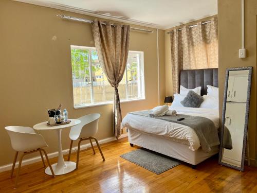 Ένα ή περισσότερα κρεβάτια σε δωμάτιο στο Jabulani's Serenity