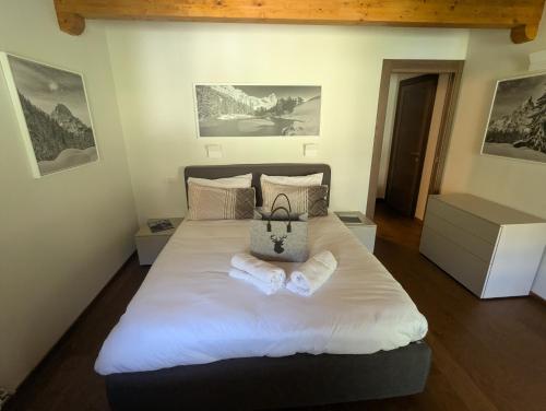 Ένα ή περισσότερα κρεβάτια σε δωμάτιο στο Maison Poluc - Maison Monte Rosa