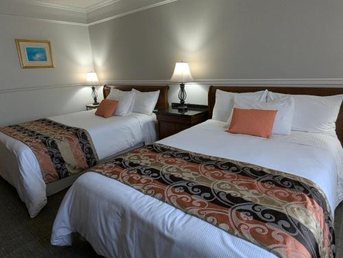 Llit o llits en una habitació de Auberge des 21