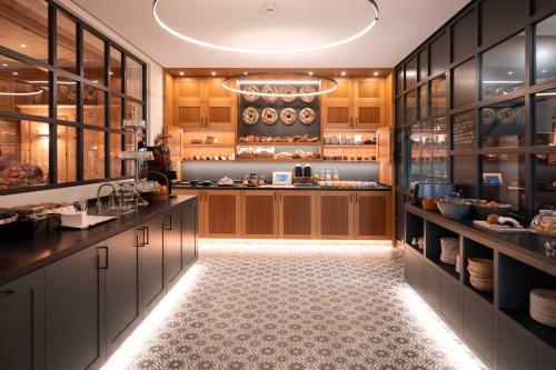 Kuchyň nebo kuchyňský kout v ubytování Hotel Albris