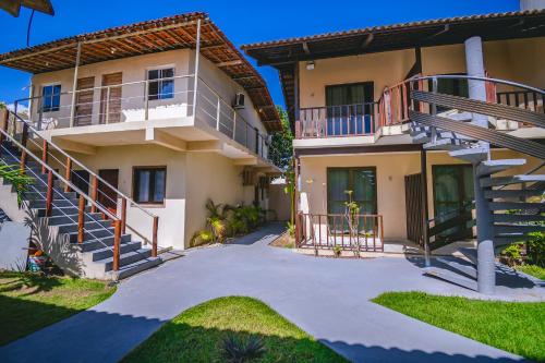 an image of a house with a staircase at Mar a Vista by Concavus in Porto De Galinhas