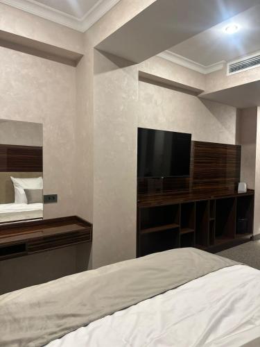 Ένα ή περισσότερα κρεβάτια σε δωμάτιο στο Nord Gate