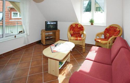 TV a/nebo společenská místnost v ubytování U8 Og