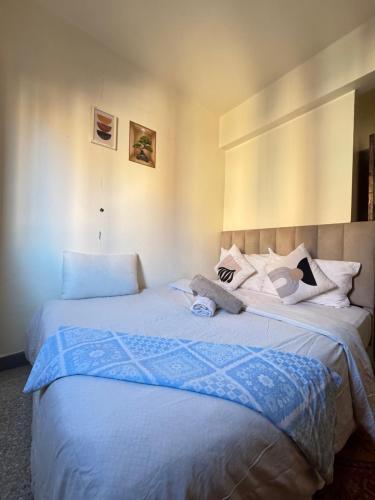 Postel nebo postele na pokoji v ubytování Steps from Airport only 5 minutes ,Ideal for Travelers