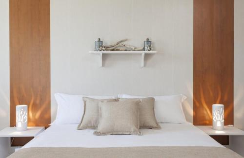 Postel nebo postele na pokoji v ubytování Spiaggiabella Resort