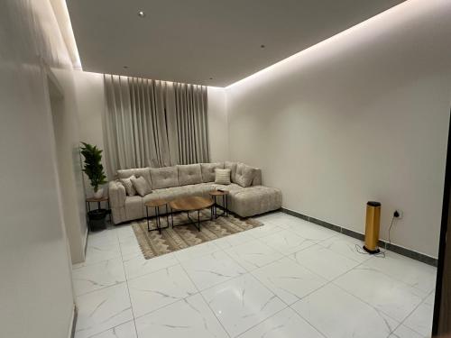 Posezení v ubytování شقة غرفة وصاله ومطبخ