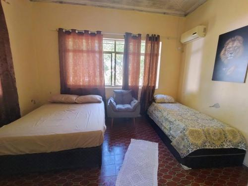 Postel nebo postele na pokoji v ubytování Hospedagem Becker