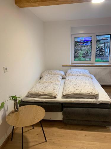 Ένα ή περισσότερα κρεβάτια σε δωμάτιο στο Thaya-Auszeit