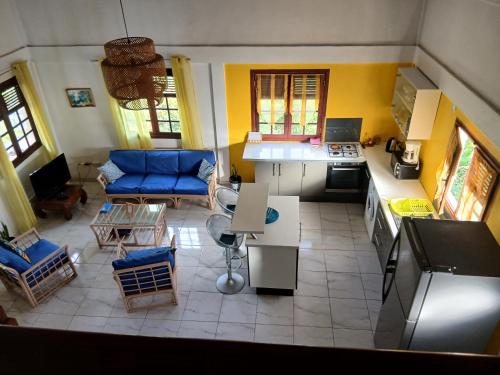 an overhead view of a kitchen and a living room at Villa Océane in Dublanc