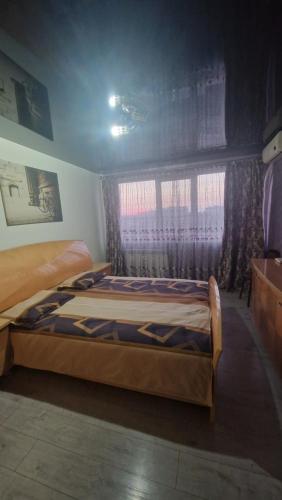 Postel nebo postele na pokoji v ubytování Apartament Faleza Dunarii