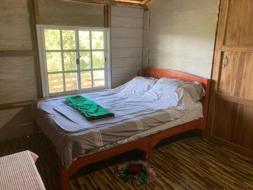 Giường trong phòng chung tại Sabai Hill