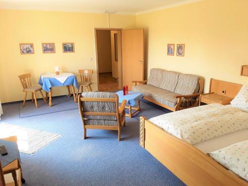 Posezení v ubytování Gemütliche Ferienwohnung Mit Großem Garten